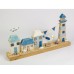 Lighthouse and 3 Cottages on Plinth, 32cm